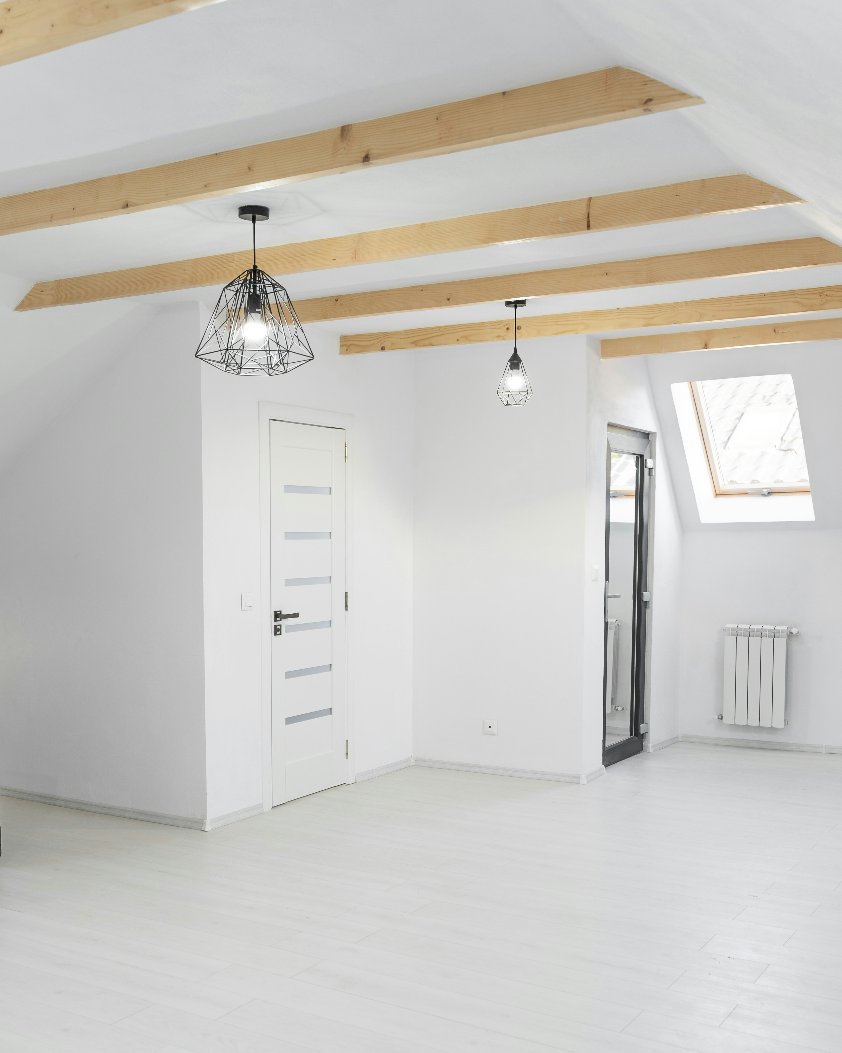 white wooden cabinet near white wooden door